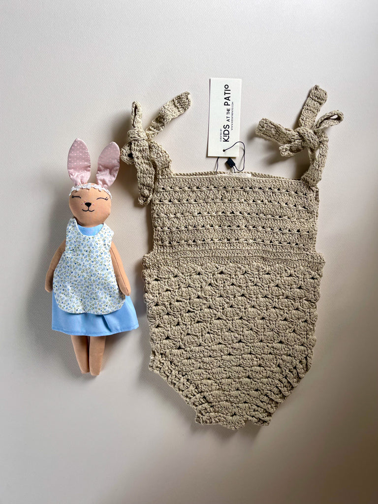 The bunny rag doll is not included